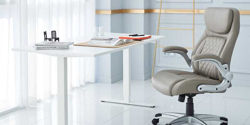 The Taupe Posture Ergonomic PU Leather Office Chair in an office building
